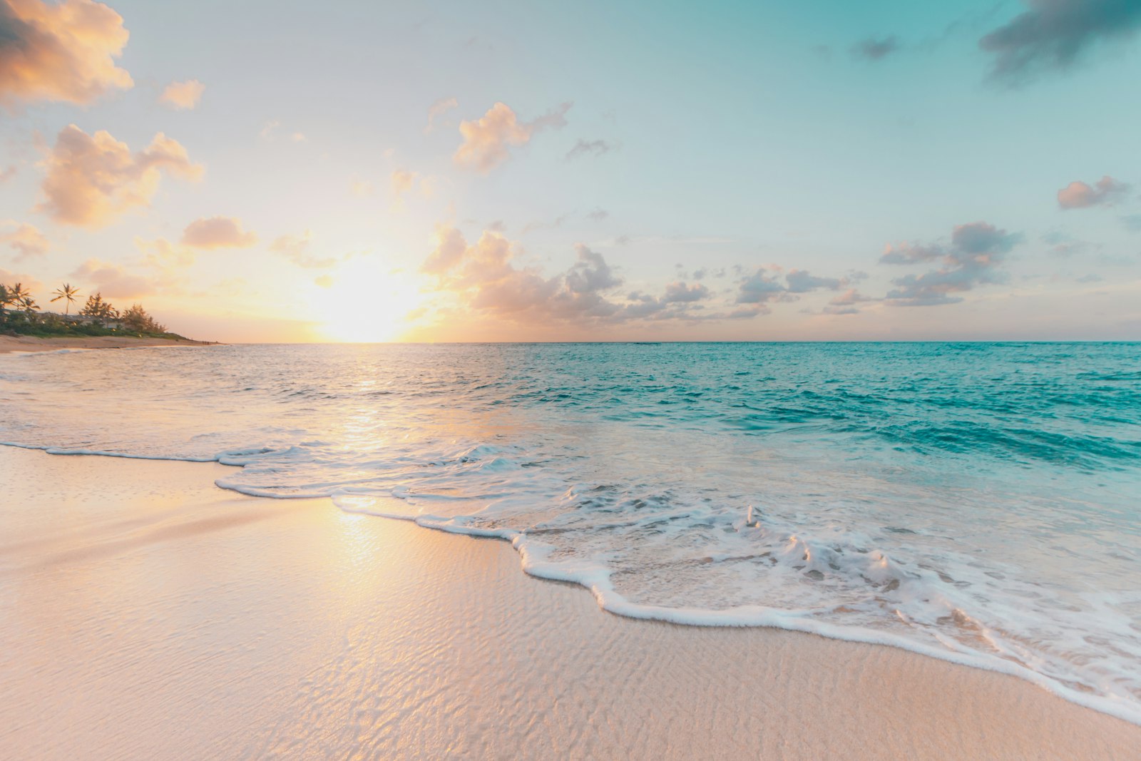 turquoise Mediterranean water glowing softly at dusk