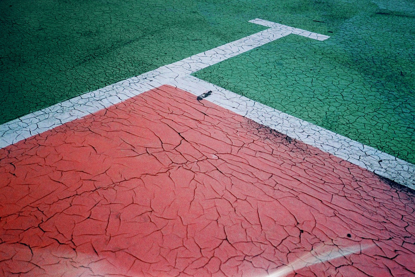 The painted lines of a hard court seen from above